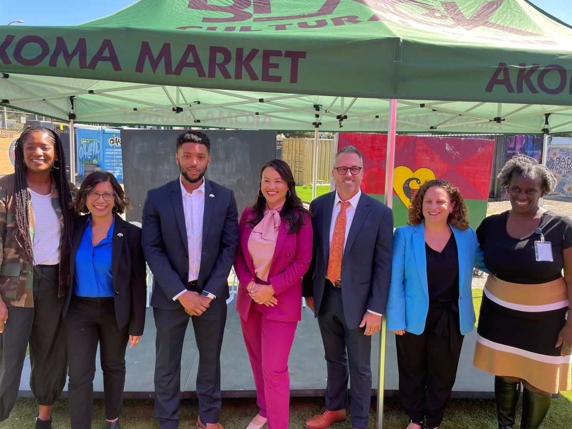 Mayor Thao stands with Councilmembers, Affordable Housing officials, and community members at Aroma Market after the state announced $40 million for affordable housing in Oakland.
